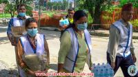 Handing over essential items at Kathmandu