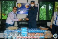 Handing over essential items at Kathmandu