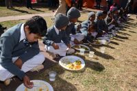 Distributing necessary materials to visually impaired students