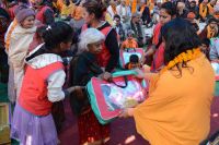 Distributing Necessary Materials to sadhus and batuks 