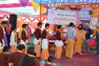 Distributing Necessary Materials to sadhus and batuks 