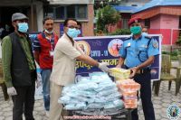 Handing over essential items at Hetauda